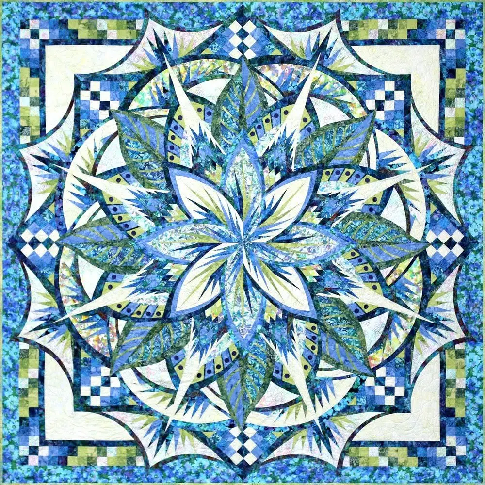 Paper pieced leaf and star quilt in blues and greens, made by Karen Jarrett